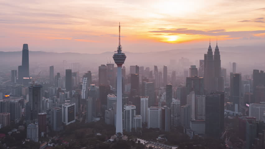 Cityscape Time lapse : Aerial Kuala Lumpur city view during morning overlooking the city skyline with beautiful misty landscapes in Malaysia. Prores Full HD