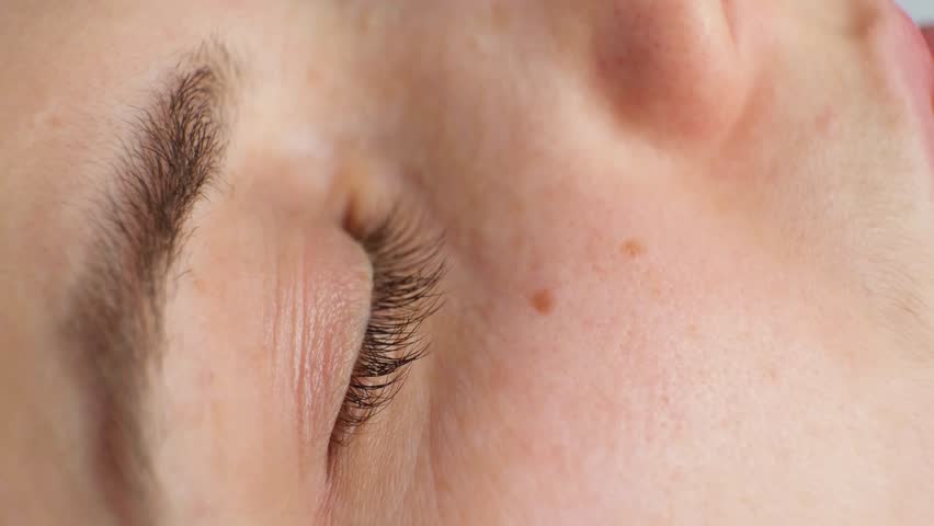Eyes of a sleeping woman, phases of sleep, phase of rapid eye movement, restless poor sleep, anxiety.