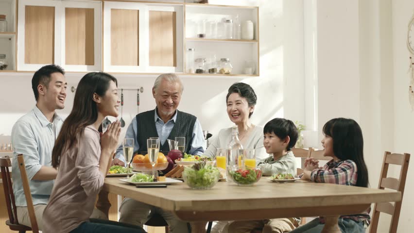 happy three generation asian family enjoying time together while having meal at home Royalty-Free Stock Footage #1098030977