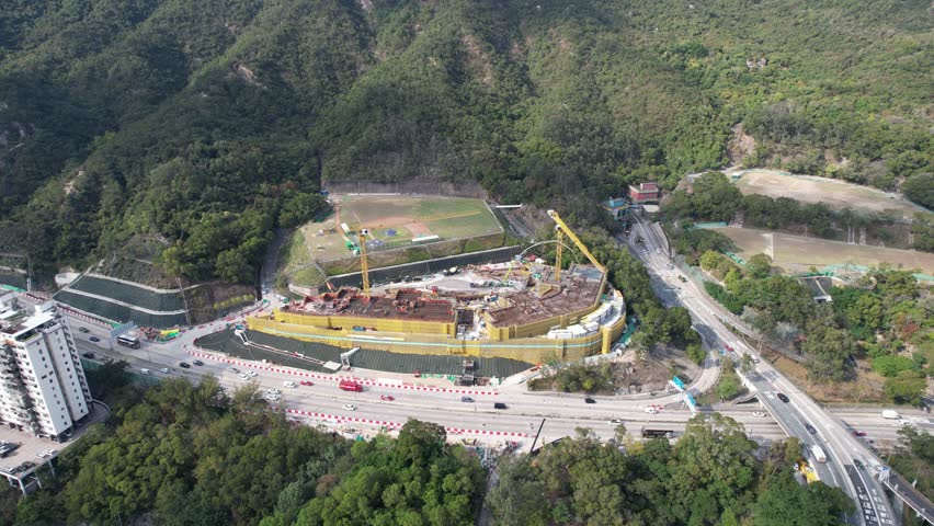 City Skyview in Hong Kong 4K Aerial drone shot of the Premium Villa independent house and residential area in Kowloon Tong Peninsula near Lion Rock, Victoria Harbour Financial Central District
