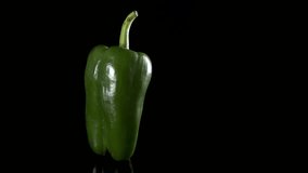 Vegetable sliding bell pepper Spinning and Rotating Isolated on black Background - Powered by Shutterstock - Get 15% off with code: PIKWIZARD15