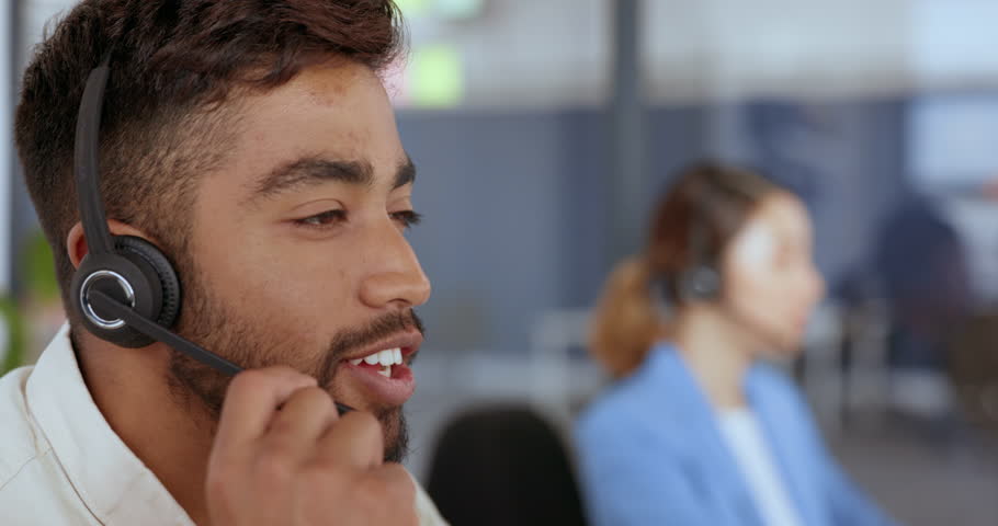 Call center, telemarketing and face of a man giving advice, technical support and help online on a computer. Contact us, customer service and consultant consulting for sales, crm and service job Royalty-Free Stock Footage #1098037179