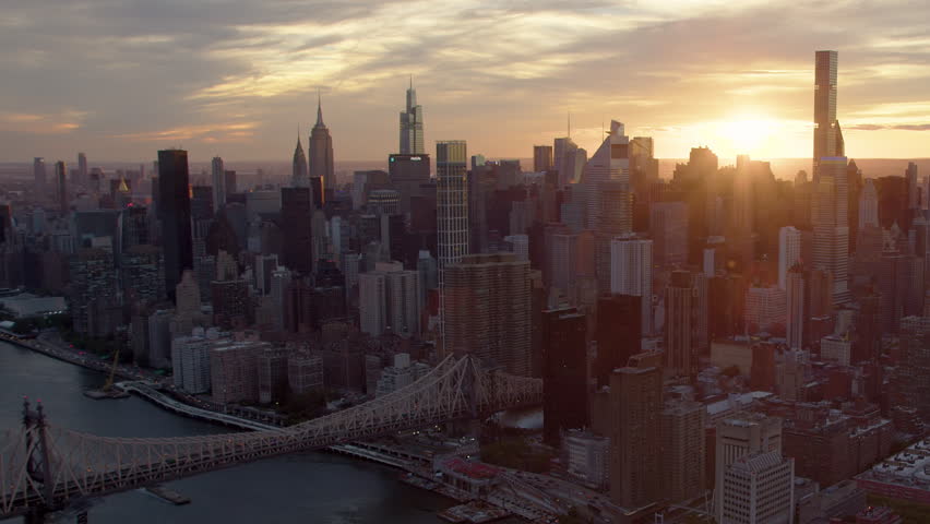 


Aerial Shot of Upper East Side  Skyline in Manhattan, New York City. Amazing Cloudy Sky at Sunset. Famous Queensboro Bridge. High Quality Footage Shot from Helicopter over East River. United States Royalty-Free Stock Footage #1098037771