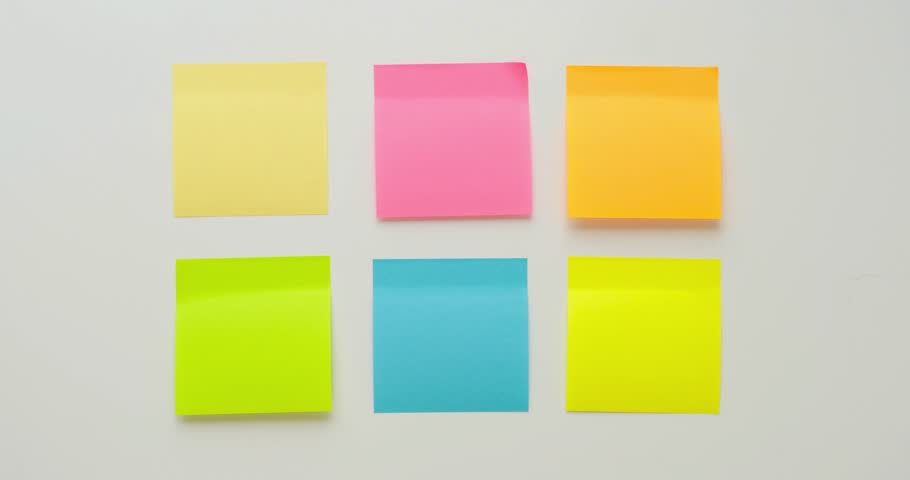Six multi-colored paper on a white background. Looped 4K stop motion animation