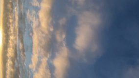 Glorious golden sunrise in the frozen morning in winter - aerial hyperlapse. Blue and yellow sky
Sun rising in the background during morning time on a cloudy morning. Vertical video - Powered by Shutterstock - Get 15% off with code: PIKWIZARD15