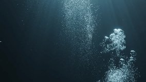 Underwater background with water bubbles rising up to the surface in slow motion - can be used for VFX plates - Powered by Shutterstock - Get 15% off with code: PIKWIZARD15