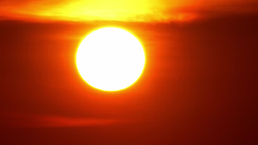 Sunset in the orange yellow red sky timelapse. Epic setting sun as big bright hot disk. Vibrant color background time Lapse. Cinematic sun set at summer sky. Royalty-Free Stock Footage #1098058859