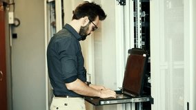 It Administrator Maintenance In Server Room. Cloud Computing Data Center. Network Specialist In Server Room. Hi-tech Cluster Internet Database. Technician On Datacenter Solution. Data Storage Racks - Powered by Shutterstock - Get 15% off with code: PIKWIZARD15