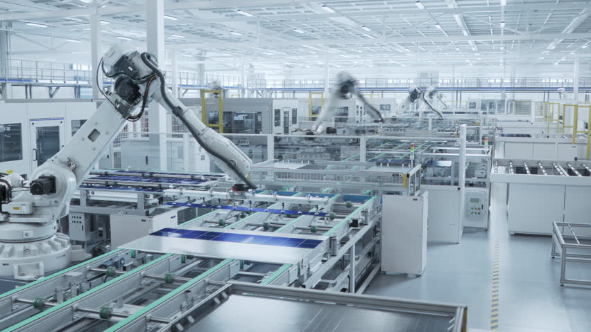 Time-lapse video of Automated Solar Panel Production Line. White Industrial Robot Arm Assembles Solar Panel, Placing PV Cells. Modern, Bright Manufacturing Facility.