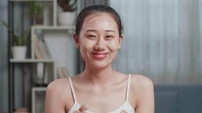 Close Up Of Beautiful Young Asian Woman Cleaning Face And Smiling While Taking Care Of Her Skin At Home
 - Powered by Shutterstock - Get 15% off with code: PIKWIZARD15