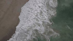 Drone head shot of sea wave. sea ​​foam 4K videos. ocean footage.