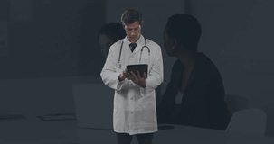 Animation of statistics and data processing over male doctor. Global medicine, healthcare services, computing, finance, business and data processing concept digitally generated video.