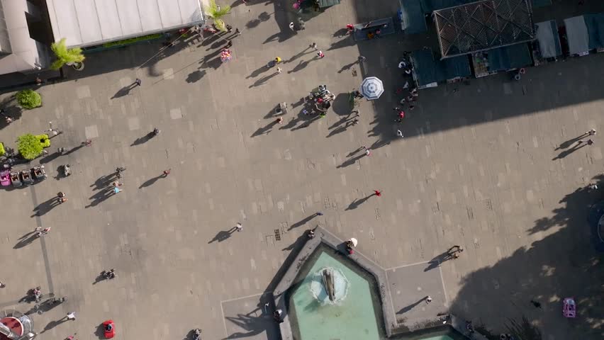 People Walking At The Urban Plaza Tapatia Near Downtown Guadalajara, Jalisco, Mexico. Aerial Shot