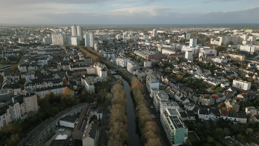 Saint Martin canal and surrounding landscape, Rennes in France. Aerial forward Royalty-Free Stock Footage #1098094985