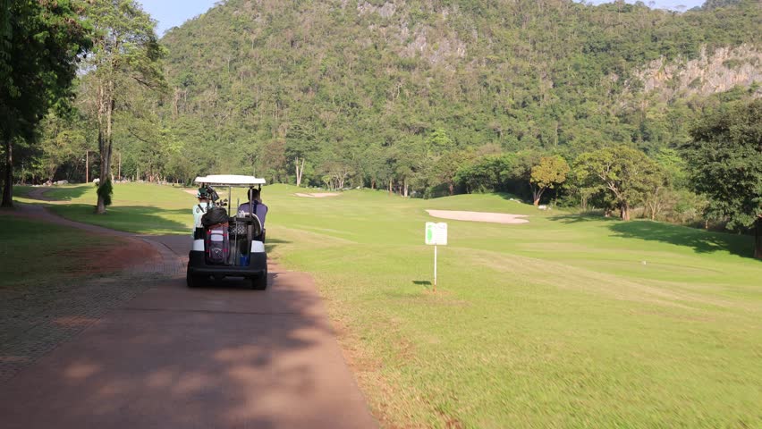 December 13, 2022. Khao Yai Thailand. Following a golf cart down a track
