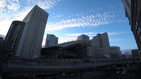 UMEDA, OSAKA, JAPAN - SEPTEMBER 2022 : View of Osaka and Umeda train station in daytime. Travel and transportation concept video.