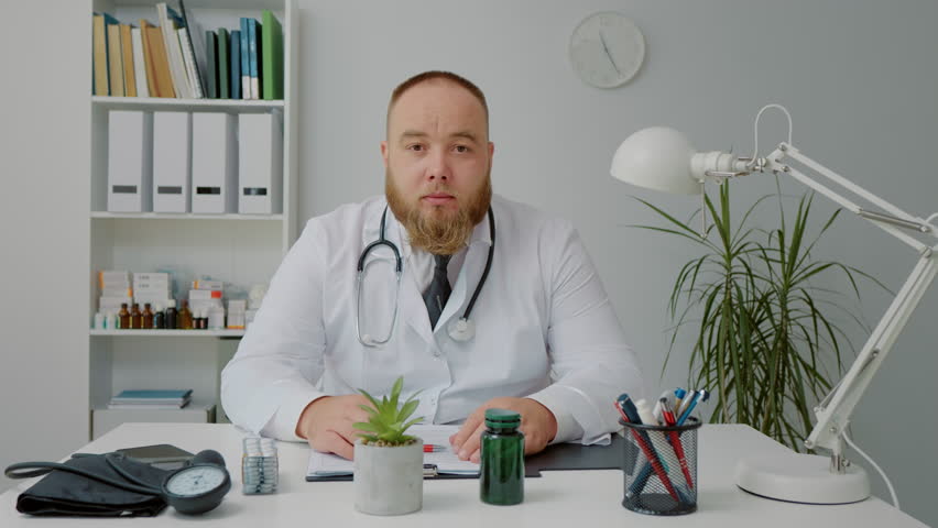 POV Portrait of Professional Doctor Has Video Call with a Patient. Medical Professional Talking via Internet. Telemedicine concept. | Shutterstock HD Video #1098103489