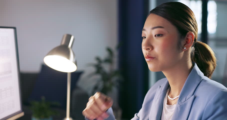 Asian accountant and woman at computer thinking while checking budget on work screen in office. Strategy, problem solving and focus of accounting employee busy with analysis of spreadsheet. Royalty-Free Stock Footage #1098105267