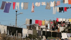 Clothes are dried on the streets of Batumi. A lot of laundry is dried on houses and balconies in Batumi. Life in Batumi.