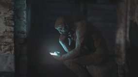 Thinker statue holding a smartphone. 3D animation of Auguste Rodin 100 year old sculpture. - Powered by Shutterstock - Get 15% off with code: PIKWIZARD15
