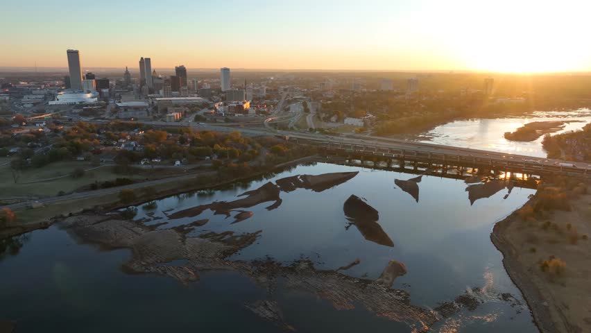Tulsa Oklahoma morning shot over Arkansas River. Colorful golden hour light.