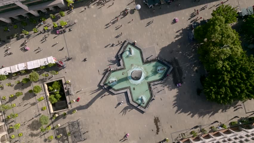 Topdown View Of Inmolacion de Quetzalcoatl Sculpture At The Plaza Tapatia In Guadalajara, Jalisco, Mexico. aerial rotating