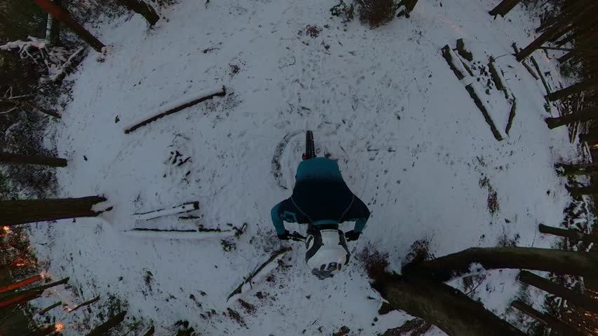 360 video of MTB XC enduro downhill freerider cycling down a snowy trail in Stavanger Norway