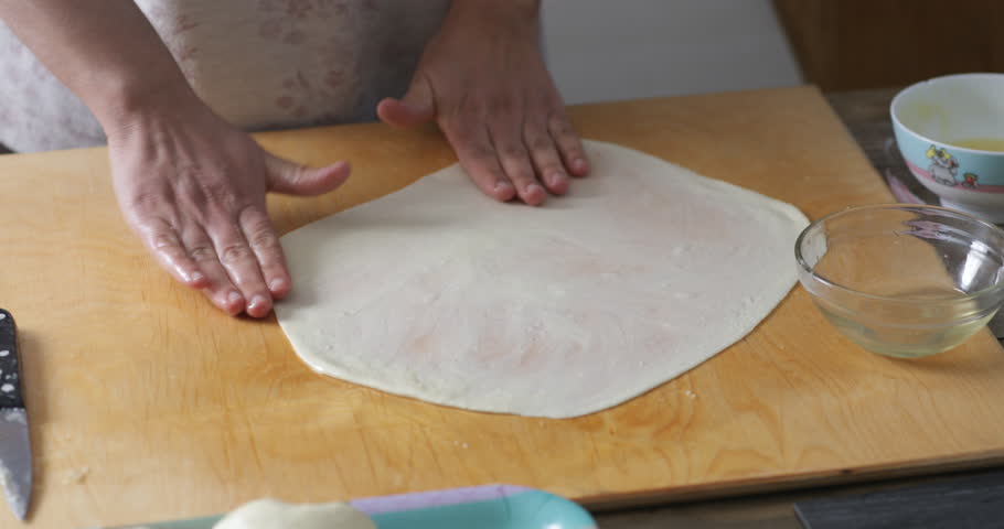hand kneading a moroccan flatbread or mssammen Royalty-Free Stock Footage #1098164601