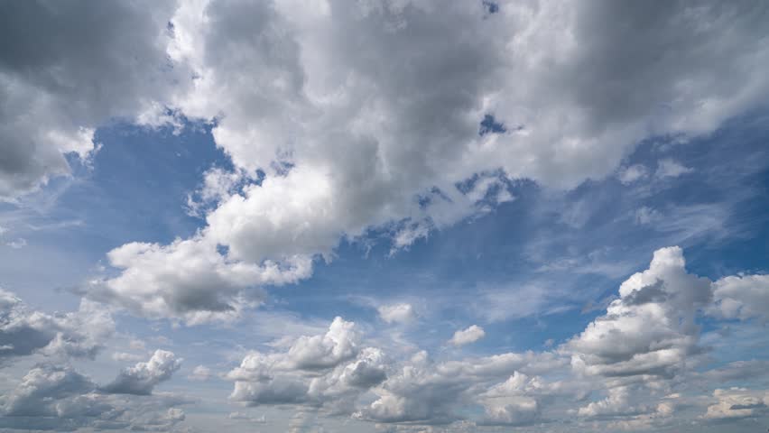 Blue sky white clouds. Puffy fluffy white clouds. Cumulus cloud cloudscape timelapse. Summer blue sky time lapse. Nature weather blue sky. White clouds background. Cloud time lapse , video loop Royalty-Free Stock Footage #1098168699