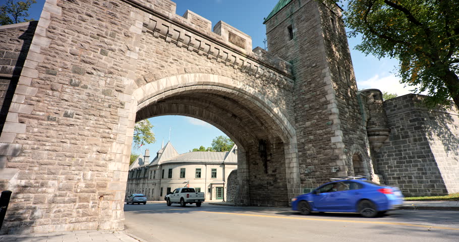 Quebec City, Canada - September 26, 2021:  A car drives through the old stone historic St. Louis Gate in Quebec City Canada