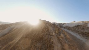 FPV Video, drone point of view, flying through the Rock Formations in Cappadocia, Goreme, Turkey.