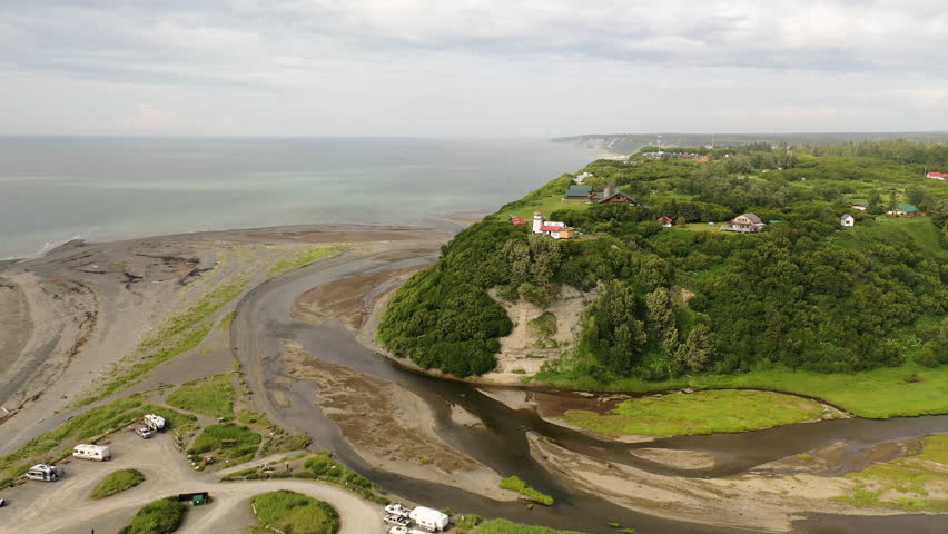 Aerial view of a small distant settlement in North America. Ninilchik Village, Alaska, United States