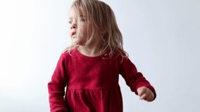 Portrait of cheerful caucasian child girl 3-4 years old showing tongue making faces at camera, fooling around, squint her eyes . Preschool little girl - Powered by Shutterstock - Get 15% off with code: PIKWIZARD15