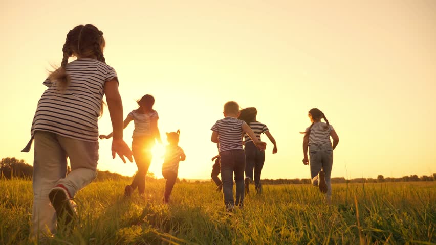 Happy family runs at sunset in the Park. Funny children play with their parents. Happy kids brothers and sisters spend time together. Mom dad and kids together | Shutterstock HD Video #1098214817