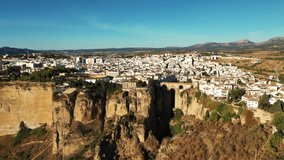 A historical city located on the edge of a huge cliff. Ronda is a town in Andalusia, Spain.