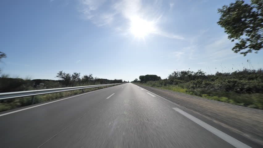 Fast white lanes passing driving on national road France lockdown period sunny   Royalty-Free Stock Footage #1098233967