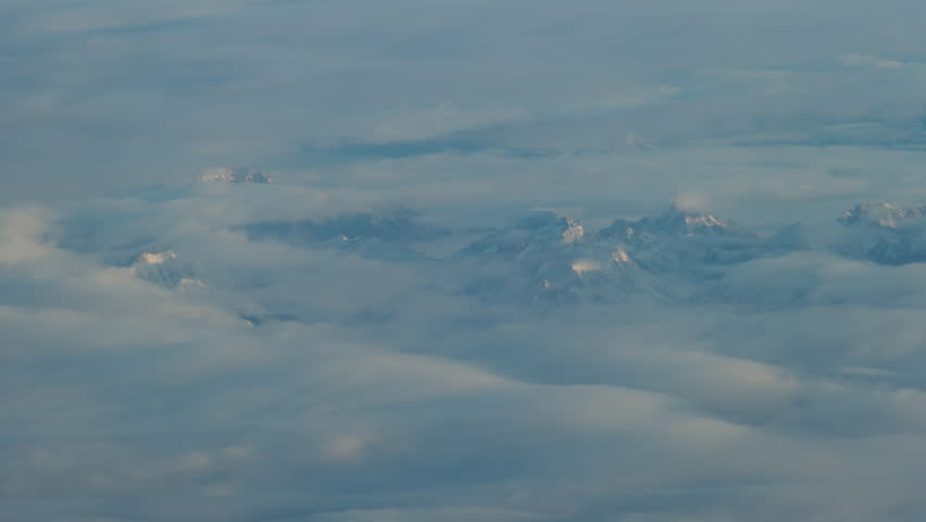 Oregon, point of view while flying in airplane looking through airplane porthole. Wide shot