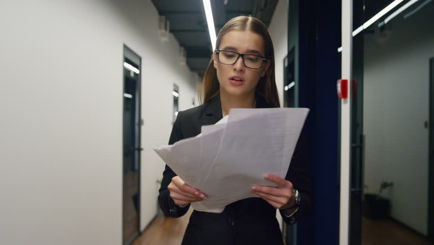 Upset worker checking papers report data. Stressed manager holding documents reading company bank debt news. Business professional feeling desperate leaving office. Depressed financial analyst worker Royalty-Free Stock Footage #1098239303
