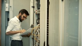 It Engineer Back Hdd Information. Data Storage Server Room. Cybersecurity Datacenter. It Support Database In Server Room. Computer Infrastructure Monitoring. Network Security On Datacenter Node Rack - Powered by Shutterstock - Get 15% off with code: PIKWIZARD15