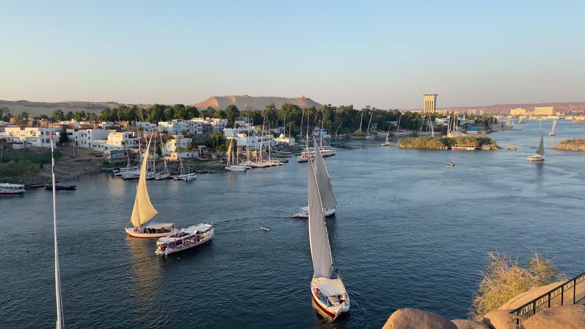Beautiful landscape with felucca boats on the Nile river in Aswan, Egypt