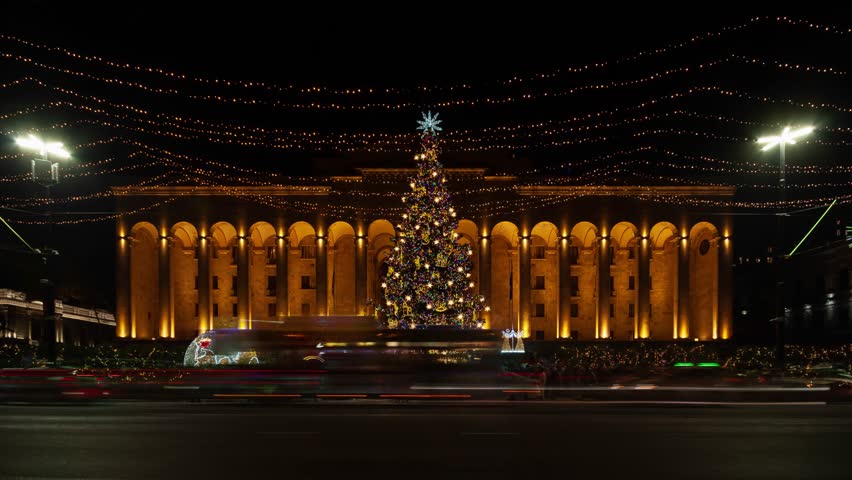 Time lapse of christmas tree in front of the Parliament of Georgia. New Year
