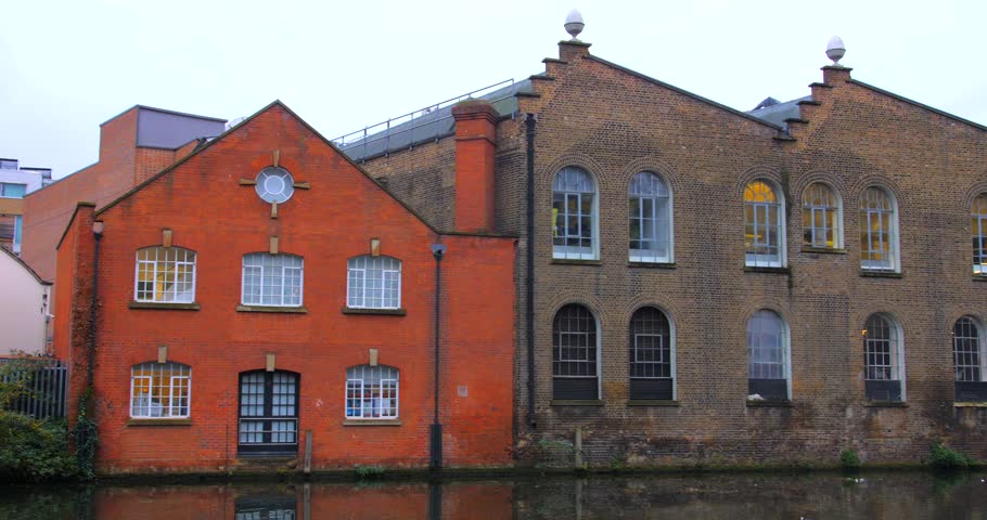 Camden Historical Industrial Buildings In Regent's Canal In London, United Kingdom. Sideways Royalty-Free Stock Footage #1098270427