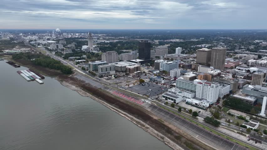 High aerial view of downtown Baton Rouge Louisiana and downtown state capitol by Mississippi River.