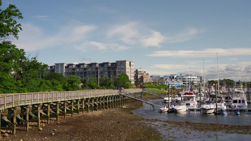 Scenery of Stamford Connecticut. Boats and high rise block buildings.