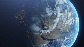Animation of the Earth seen from space. Spinning above the stars on dark background. Global space exploration. 4K - 60fps smooth and immersive video. Soft dance of gorgeous clouds. - Powered by Shutterstock - Get 15% off with code: PIKWIZARD15