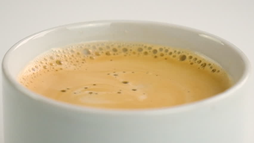 Cup of coffee with foam close-up. Selective focus. | Shutterstock HD Video #1098274347