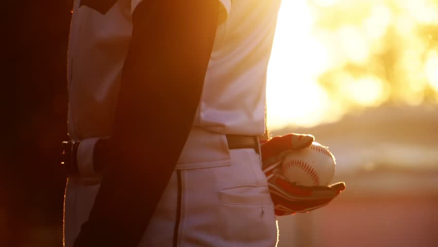 A baseball player pitcher with his baseball and baseball gloves Royalty-Free Stock Footage #1098282999