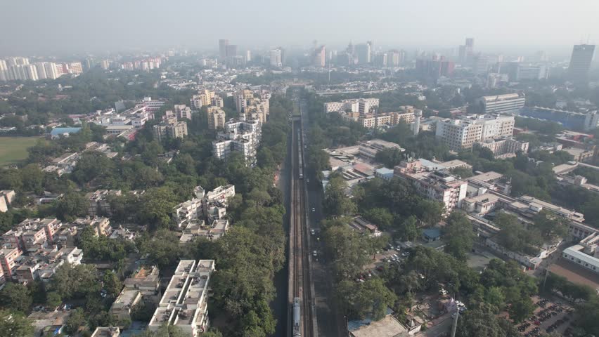Aerial Drone Clip of Delhi Metro Train at Connaught Place  New Delhi  India 