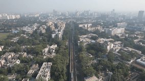 Aerial Drone Clip of Delhi Metro Train in New Delhi capital city of India 