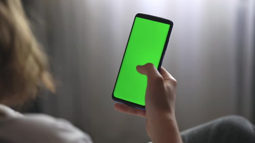 Hands holding green screen phone	 | Shutterstock HD Video #1098287905